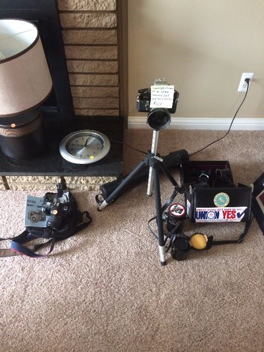 Wall clock. Newer 35mm camera. Vintage 35mm Camera with lens holders, Tripod, leather case