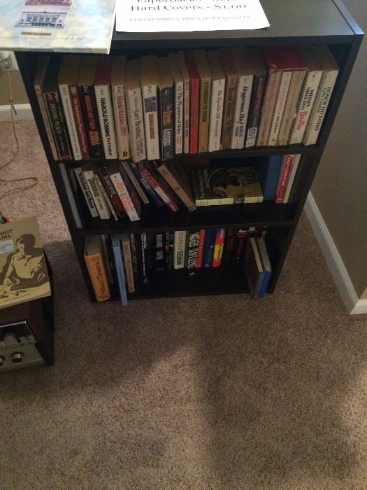 Paperback books, hardcover book, book shelf