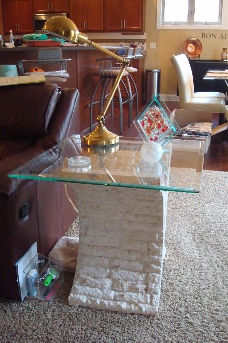 One of four glass top end and coffee tables.