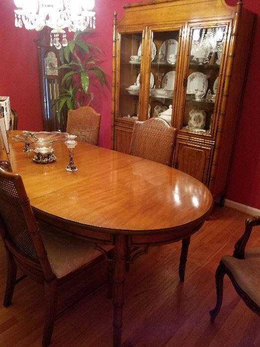 Beautiful dining room table and chairs and china cabinet.