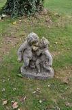 putti garden statue