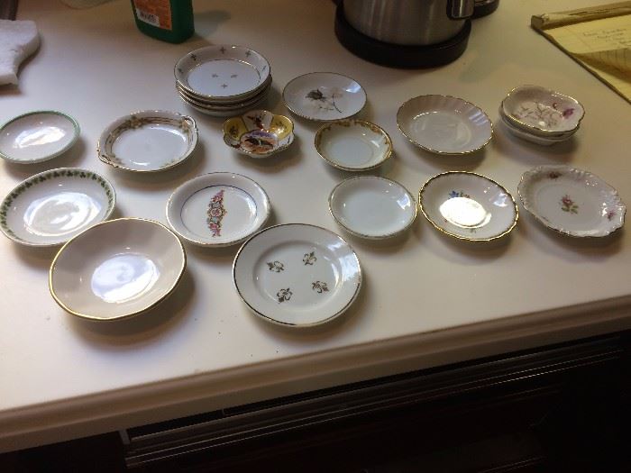 collection of small butter saucers