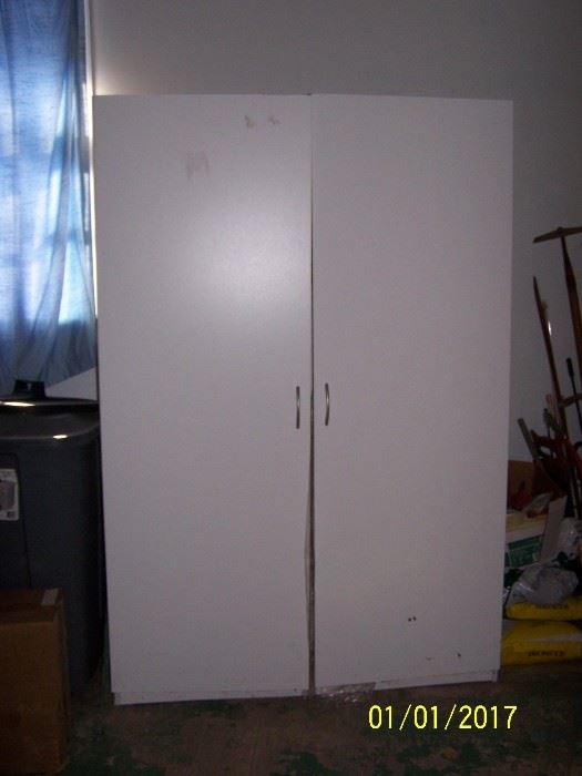 large Storage Cabinet, (they have used it for clothes)