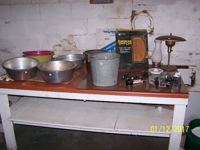 Wood Table, vintage Aluminum Pans , metal bucket, vintage metal lamp,  & misc. in Basement