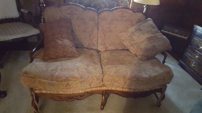 Wood frame upholstered loveseat with rush seat