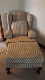 Tan diamond pattern fabric wing back chair with matching ottoman.  Two available.