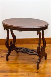 Antique Oval Mahogany Side Table W/Ornate Stretcher.  75.00 (as is)