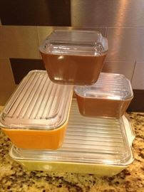 Pyrex Fridge Containers.  Small Brown (2 available) @ 4.50 ea.  Orange Container:  7.50  Yellow Container:  12.00