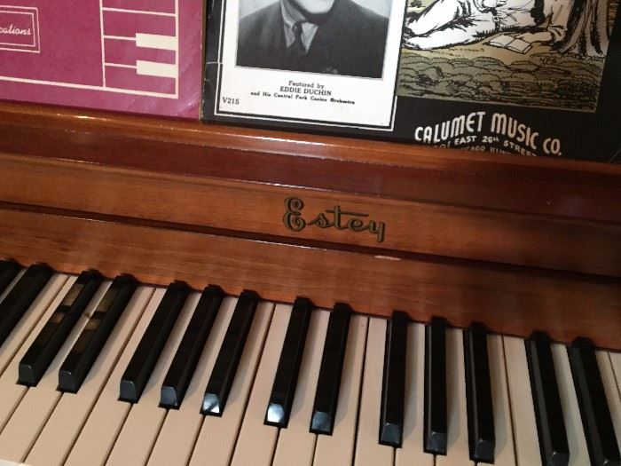 Estey piano with bench