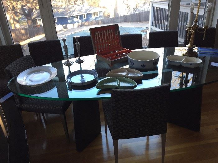 custom made glass, modern oval dining room table wth eight chairs