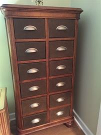 Century 12-drawer dresser with leather trim.