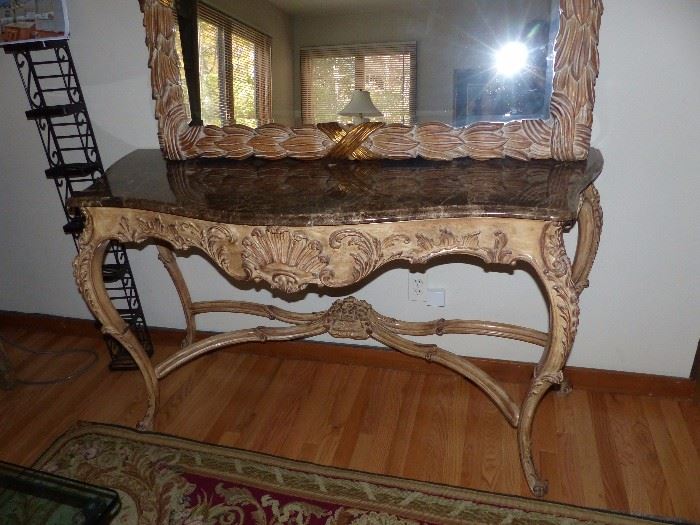 Carved wood, marble top console table with large mirror