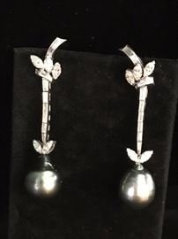 Diamond and black pearl earrings  $4500. sale $3500.