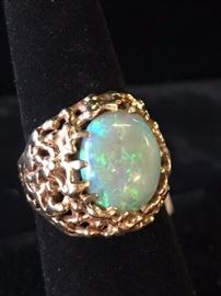 Opal and gold ring, size 7  Reg. $3500. Sale $2400.