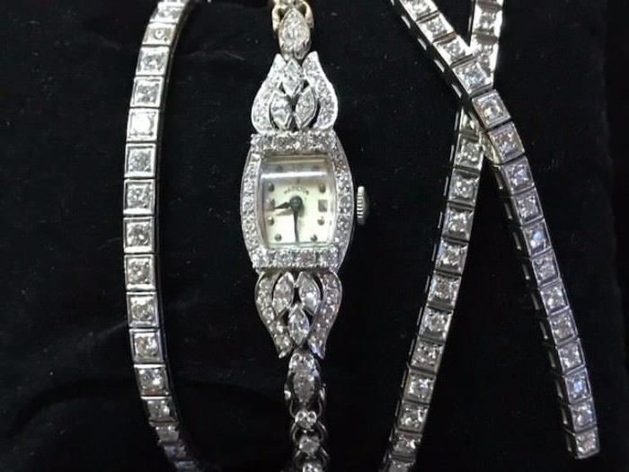 Diamond bracelet,diamond watch and diamond earrings.