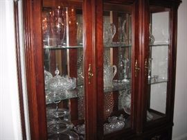 Broyhill china cabinet. A lot of crystal and pressed glass.