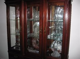 Broyhill china cabinet. Lots of crystal and glass.