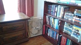 books and night stand and bookcase