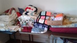lots of blankets, towels, curtains, linens