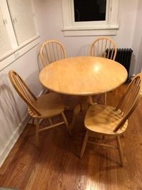 Great kitchen table and 4 chairs.  Table folds down.  $50.00