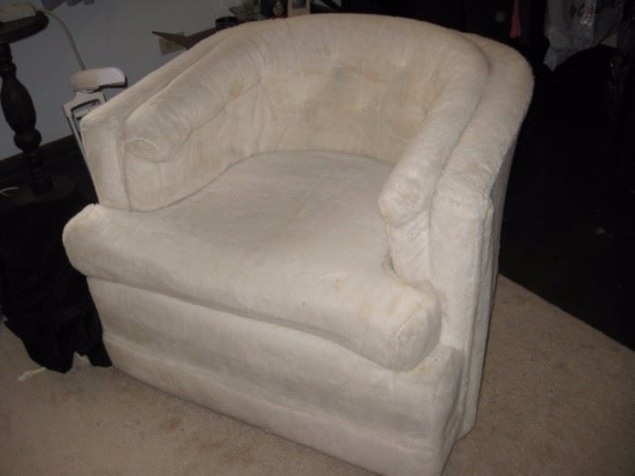 Mid-century white furry club chair.