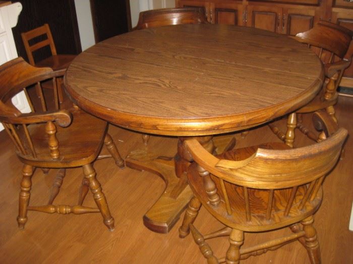 Round Pedestal table with 4 captains chairs