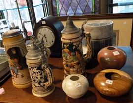 A German stein may be just the gift for the man on your list. Hand carved bowls are interesting decorative accents.