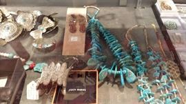 John Hardy cuff and turquoise necklaces. Not snown, John Hardy sterling double dragon head with diamond ball in mouths. This design with double dragon and diamond ball appears to be discontinued.