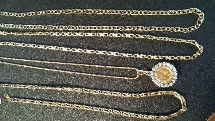 Front to back: 29" GT, 24" 14k chain with $1US  gold piece and diamond bezel, 33" 18k and 29" 18k