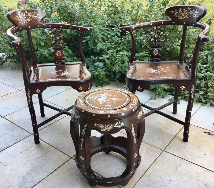 Gorgeous pair of matching Chinese solid inlaid rosewood corner chairs with matching garden stools. Stool: $500 each