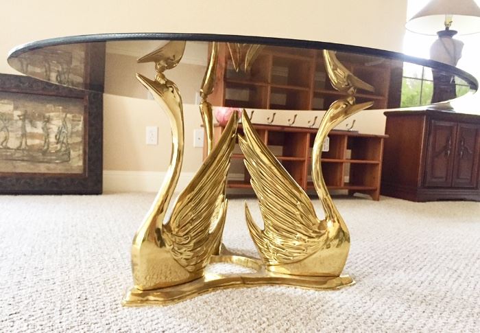 Brass seated swan base cocktail / coffee table
