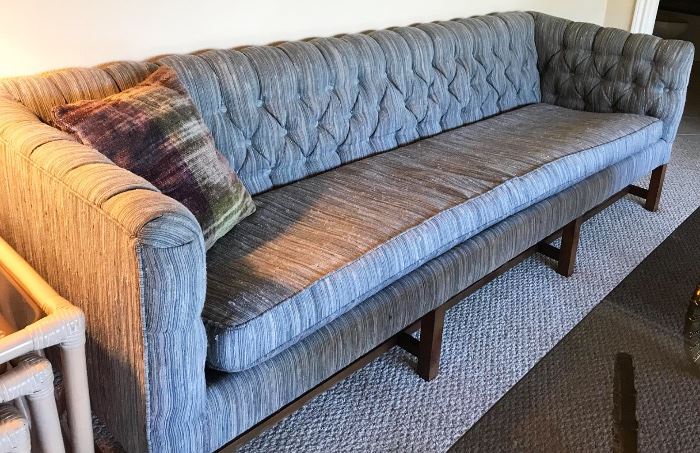 Vintage gray tufted sofa with pillow. $1,200