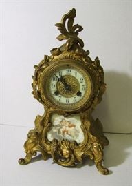 Clock # 7 C/1900 Gilt Spelter Waterbury mantle clock, Louis 14th style, 13 1/2" h.