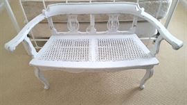 Caned distressed bench