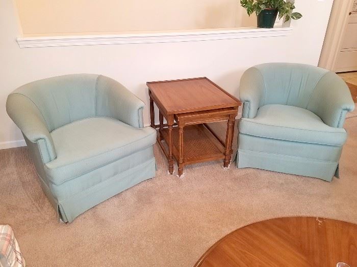 Soft blue/green armchairs and stacking tables
