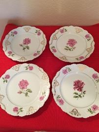 4 gold trimmed plates made in Germany