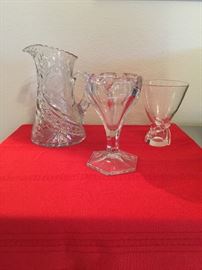 Glass pitcher and vases