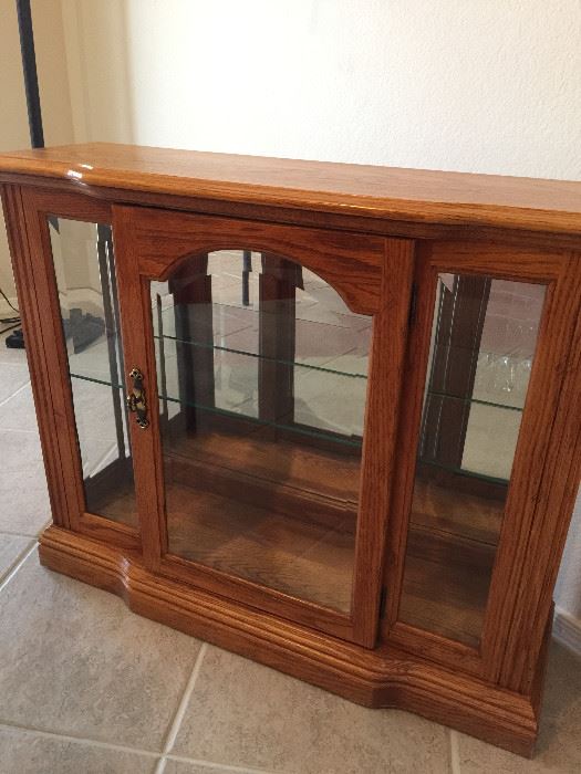 Oak glass front cabinet