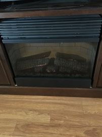 Close up of fireplace with remote