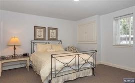 Wrought iron queen size bed, pair of Lane painted chests