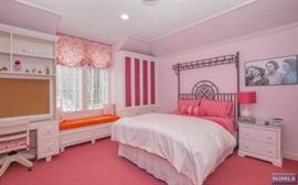 Queen size bed with wrought iron headboard