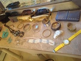 Costume jewelry, designer sunglasses