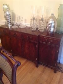 Fine made in England mahogany buffet, crystal decanters, pair of mid 20thc crystal hurricane lamps