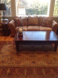 Leisure House distressed leather sofa, Karastan wool carpet