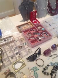 Silver and costume jewelry, designer sunglasses