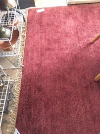 6 feet x 9 feet rust colored rug