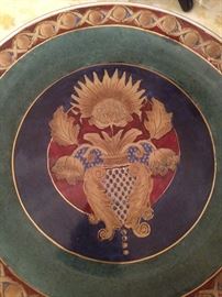 Decorative plates have matching vase