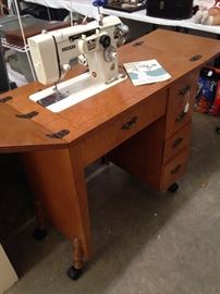 Sewing machine with Zigzag dial guide; sewing machine cabinet