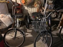 Few bicycles and 2 adult tri-cycles