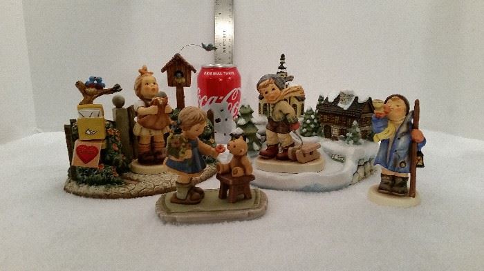 Small tableau of wonderfully  charming HUMMEL collectables.
